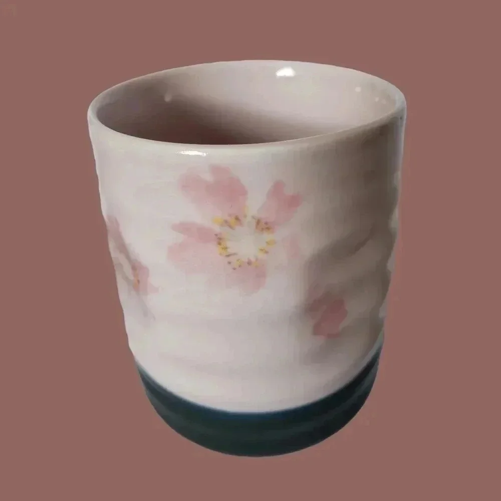-Tea cup Japanese pottery pink and black